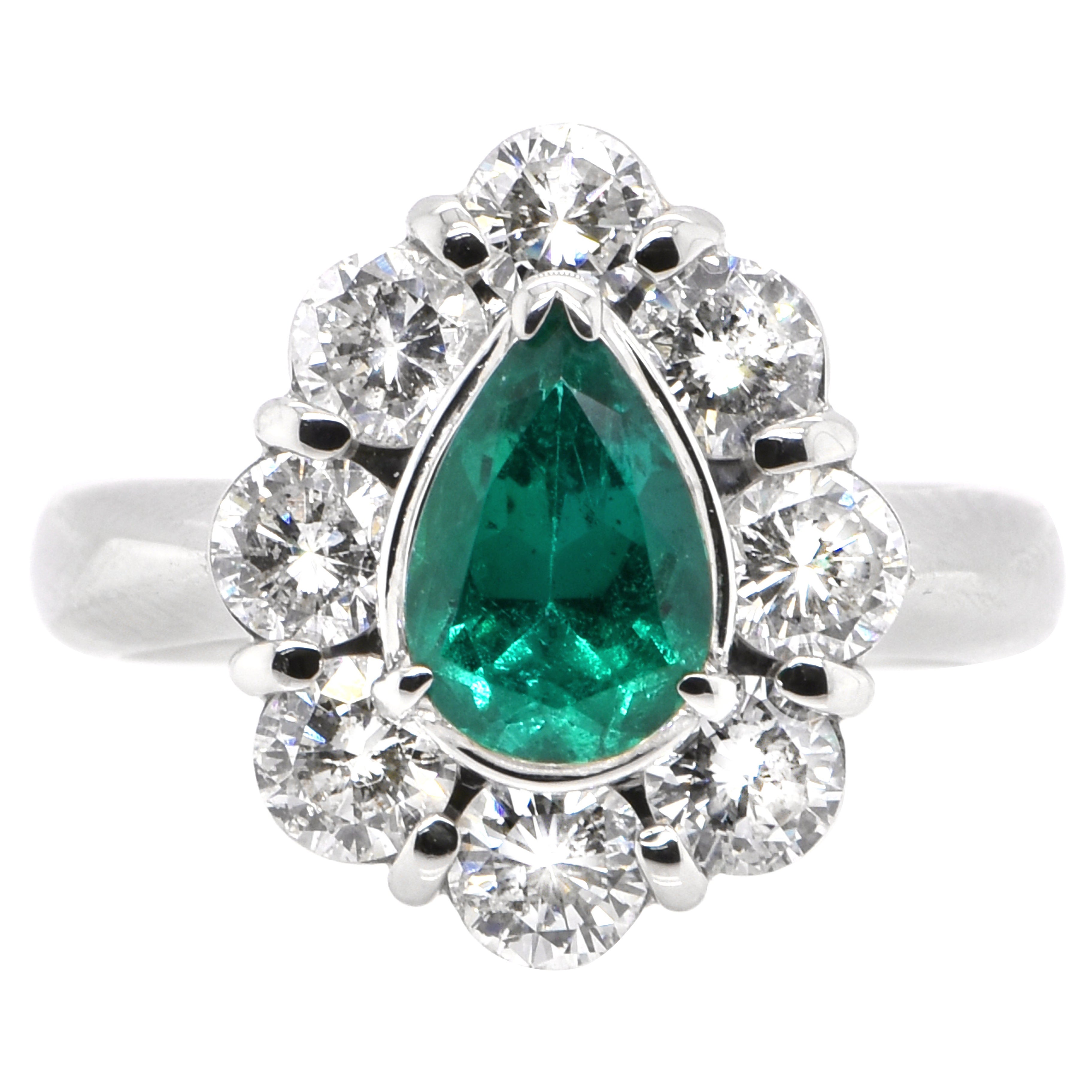 0.98 Carat Natural Pear-Shaped Emerald and Diamond Ring Set in Platinum For Sale
