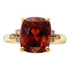 Bague en or 18 carats avec diamant et hessonite