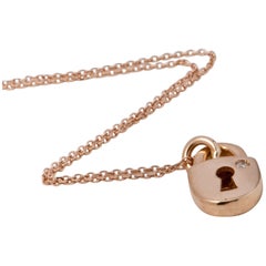  Collier pendentif forme cadenas diamant or rose 18 carats