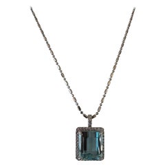 9.55 Carat Emerald Cut Light Blue Aquamarine and Diamond Halo Pendant Necklace 