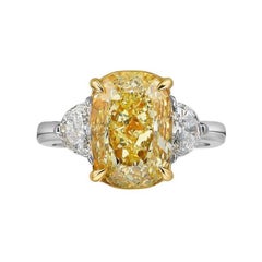 GIA Certified Fancy Yellow Diamond of 5.01 Carats on Ring