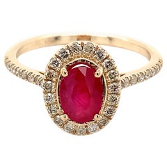 1.00 Carat Oval Shape Ruby Ring with Diamonds in 10k Yellow Gold