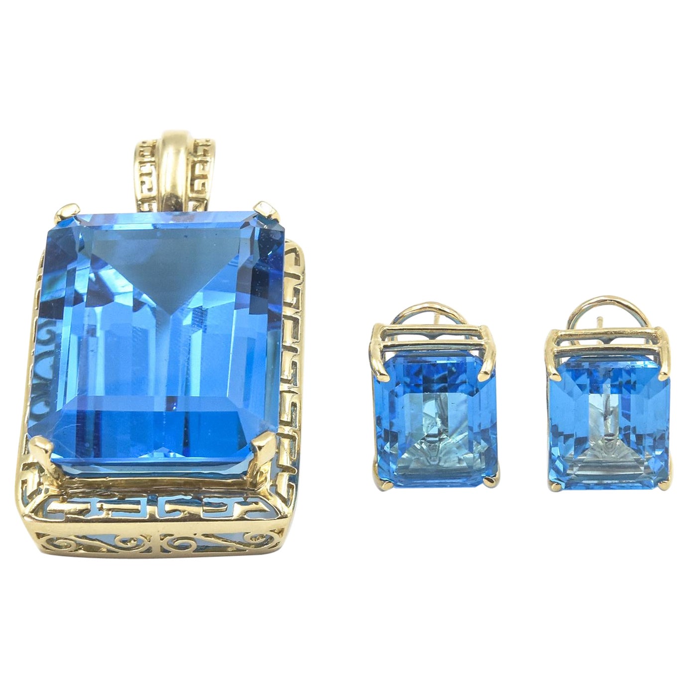 Large Emerald Cut Blue Topaz Yellow Gold Pendant with Matching Earrings For Sale