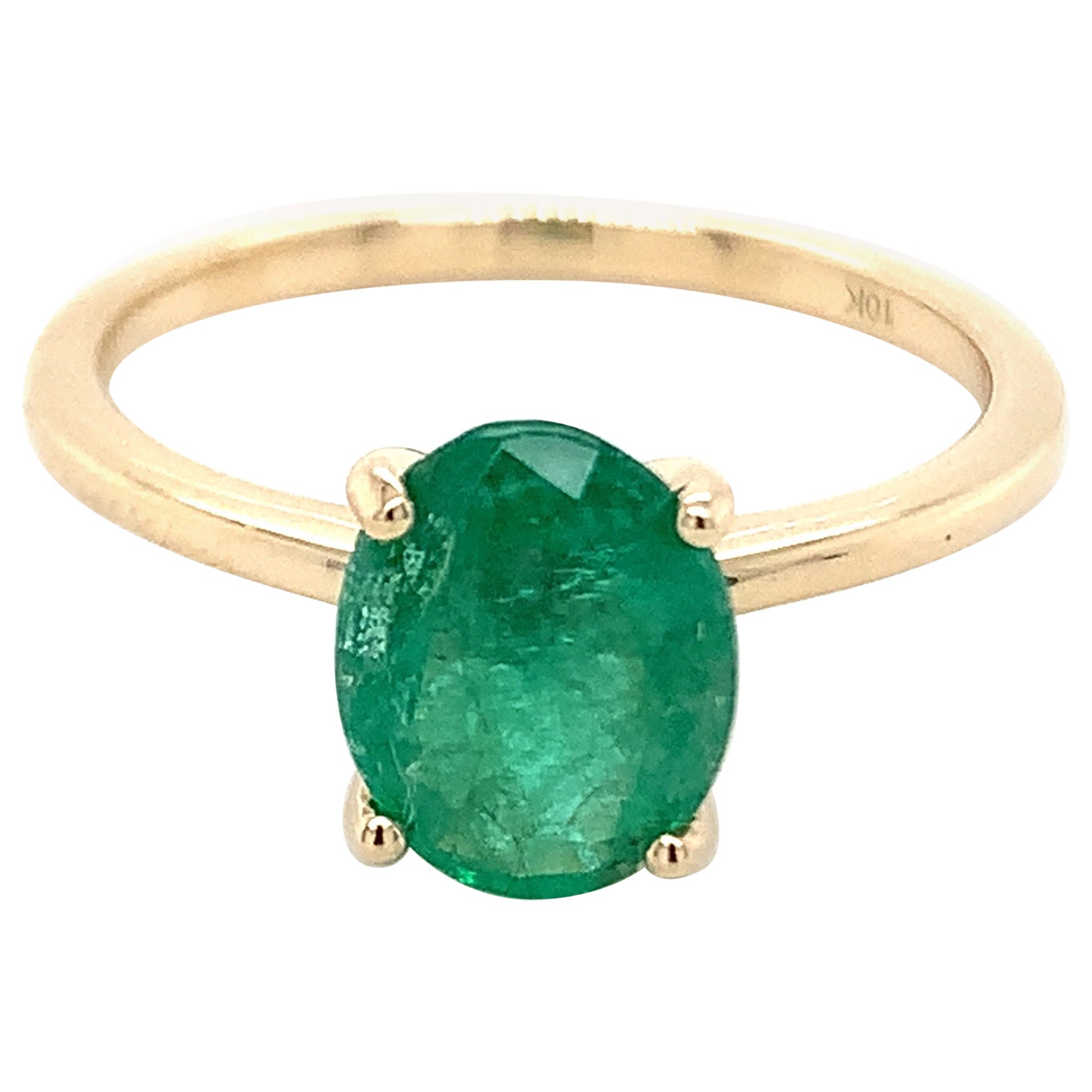 1.35 Carat Oval Cut Emerald Ring in 10k Yellow Gold For Sale