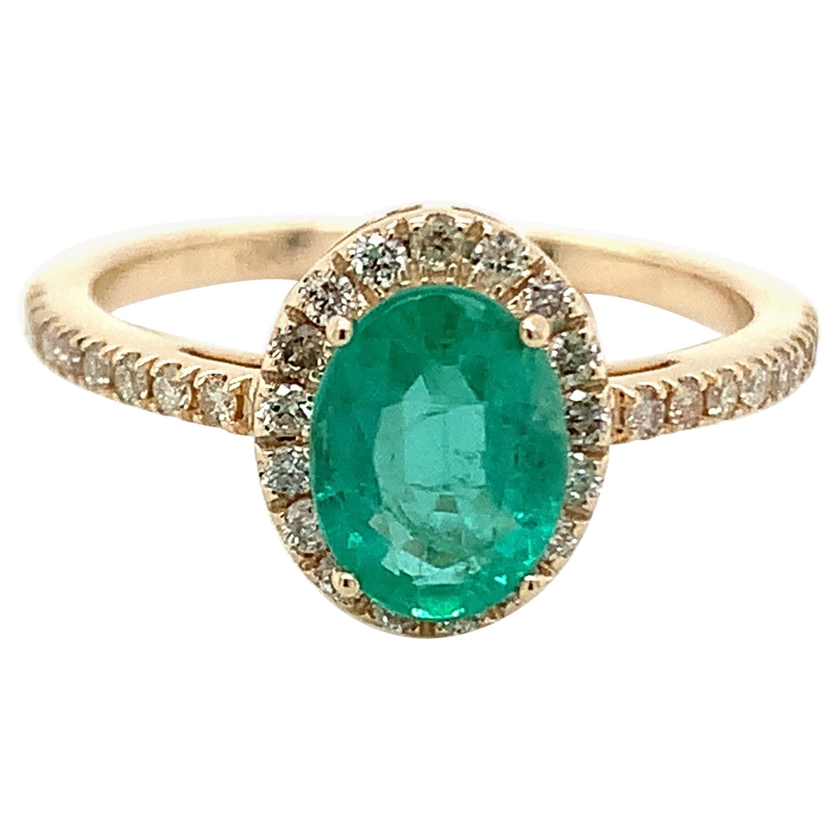 1.10 Carat Oval Cut Emerald Ring with Diamonds in 10k Yellow Gold For Sale