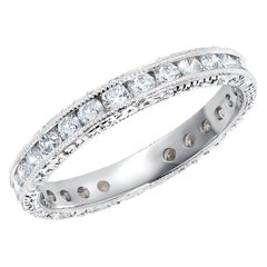 Platinum Channel Set Diamond Eternity Band with Old Master Hand Engraving