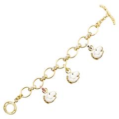Diamond Gold Bracelet with Sapphire Bails and Hand Carved Horse Heads 8