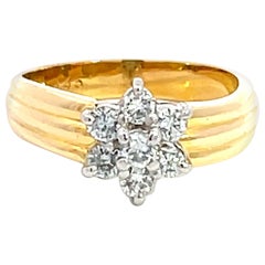 Bague fleur en or jaune 18 carats et platine avec diamants