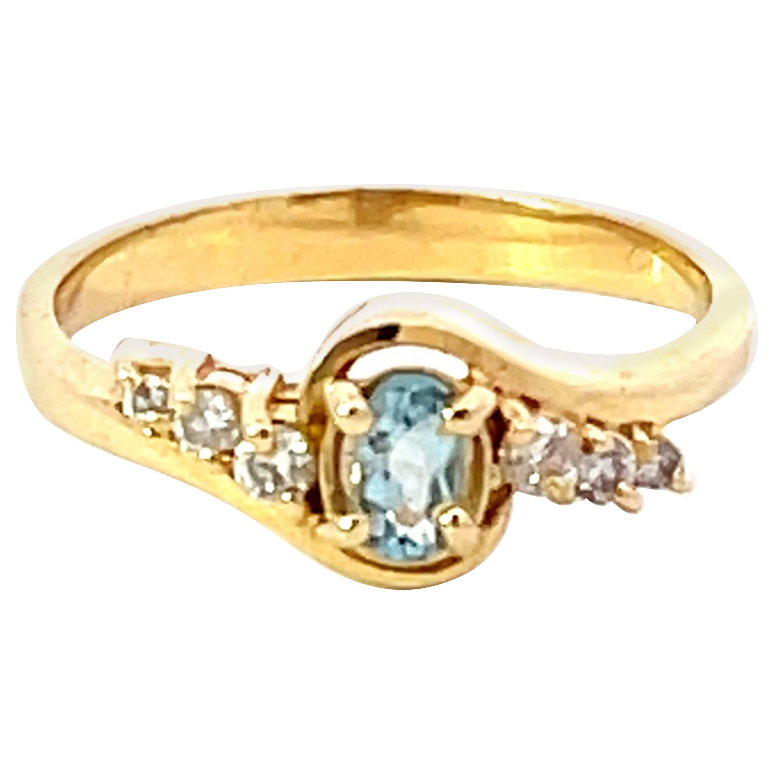 Oval Aquamarine and Diamond Ring in 14k Yellow Gold For Sale