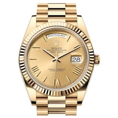 Rolex Day-Date 40mm President 18K Gold Roman Champagne Dial Watch 228238