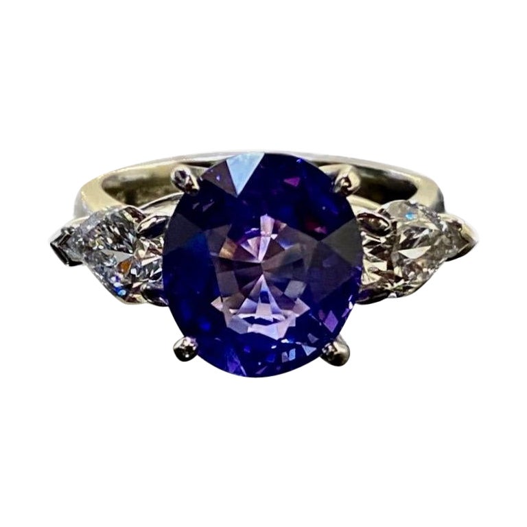 Platinum Three Stone GIA Certified 6.15 Carat No Heat Violet Sapphire Ring For Sale