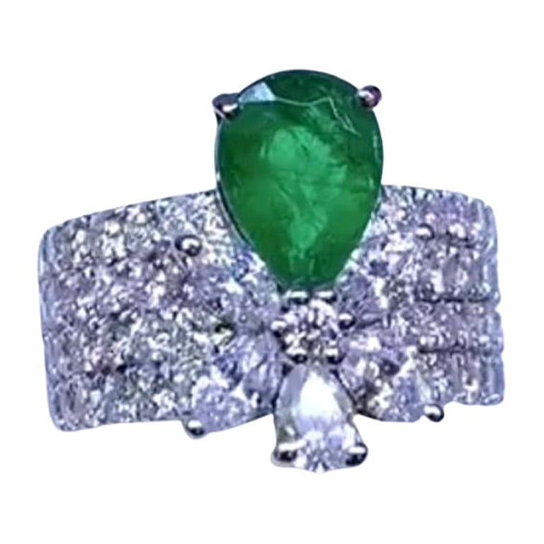 Amazing 4.23 carats of Zambia emerald and diamonds on ring  For Sale
