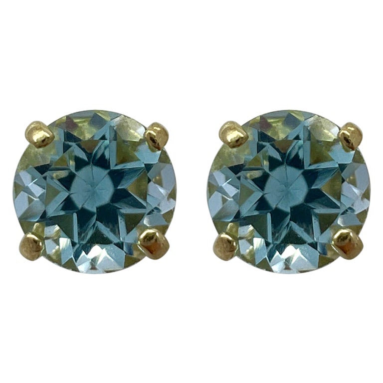 Natural 1.15ct Vivid Sky Blue Topaz Round Cut Yellow Gold 9k Stud Earrings For Sale