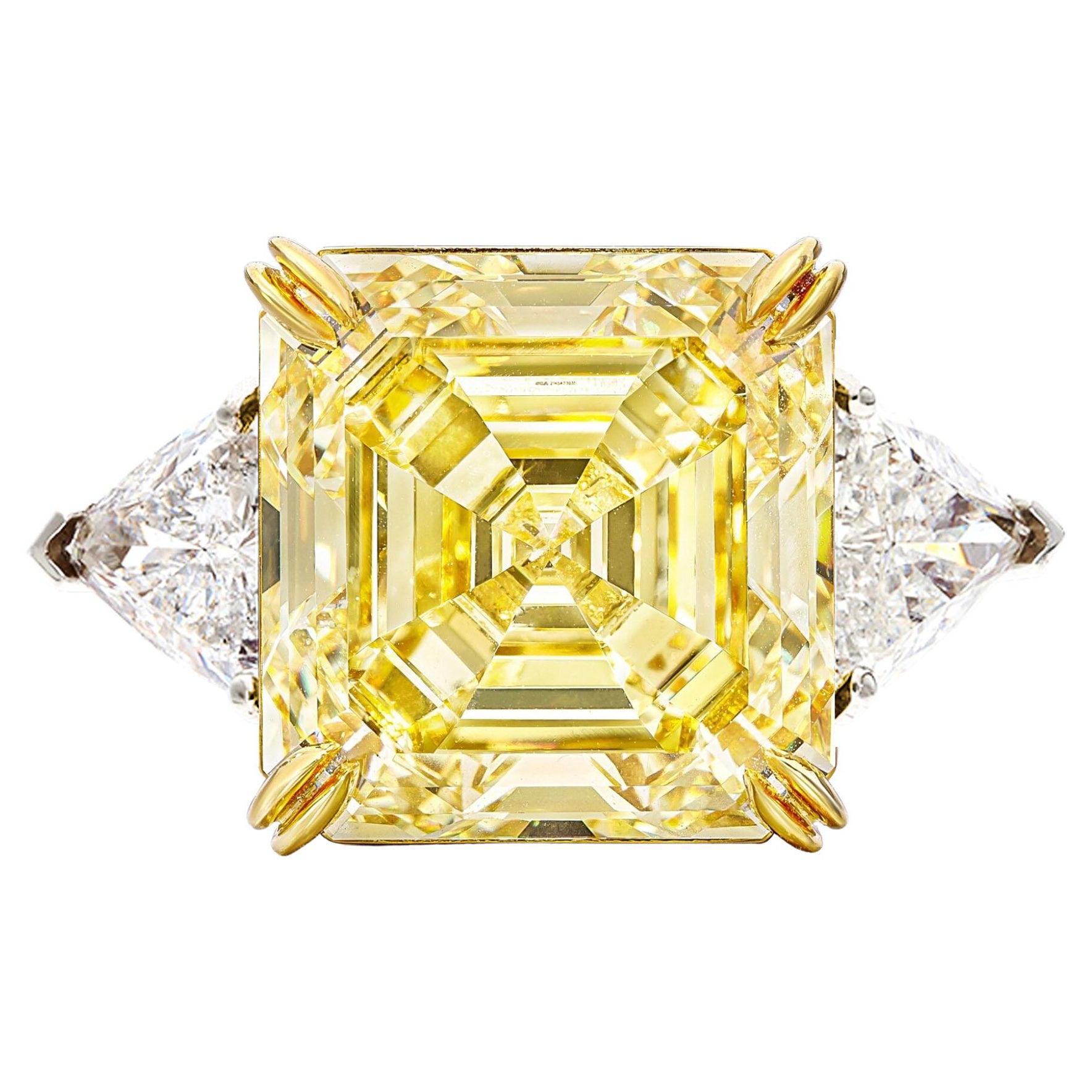 GIA Certified 12 Carat Emerald Cut Fancy Yellow Diamond Trillion side Ring  For Sale