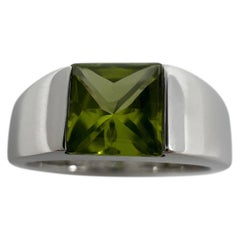 Used Cartier Vivid Green Peridot 18 Karat White Gold Tank Band Solo Ring 51