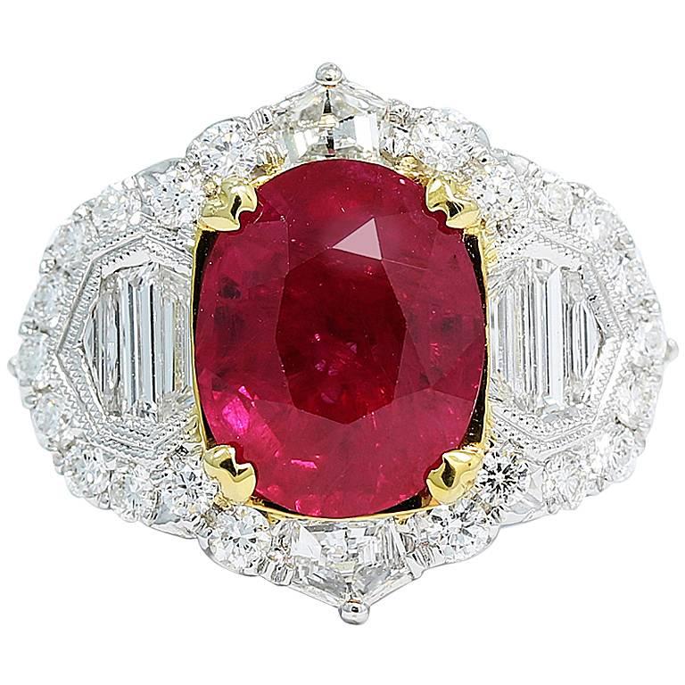 5.50 Carat Oval Ruby with Baguette and Round Brilliant Cut Diamonds Gold Ring For Sale