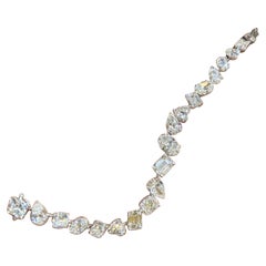 Bracelet tennis en diamants taille mixte de 26,61 carats certifiés par le GIA 
