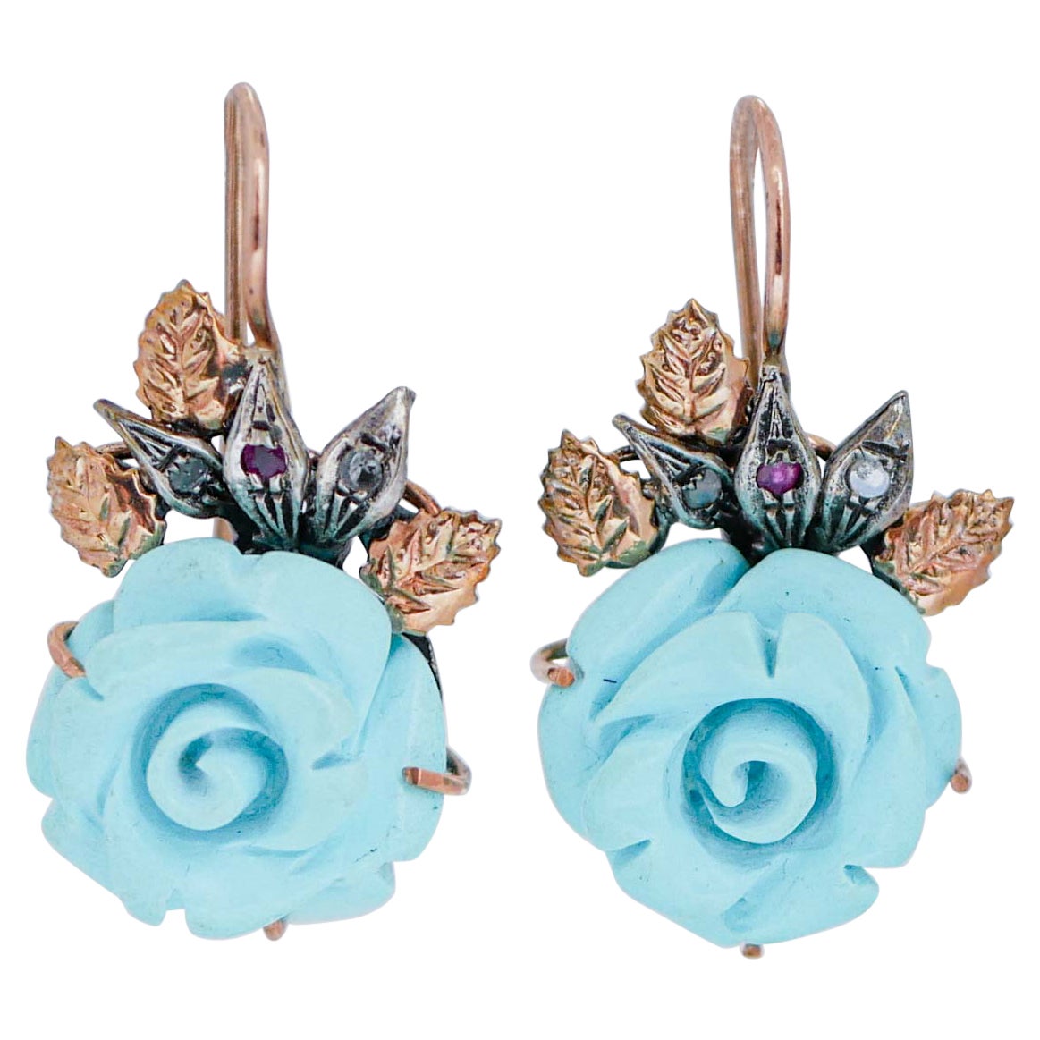 Boucles d'oreilles en or rose et argent avec turquoises, rubis et diamants.