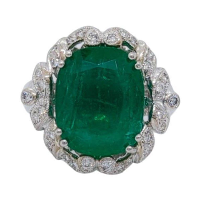 Oval Shape Emerald & Round Shape Diamond Ring in 18K White Gold For Sale