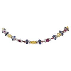 Halskette aus Platin und 14 Karat Weißgold mit mehrfarbigen Saphiren, Rubinen und Diamanten
