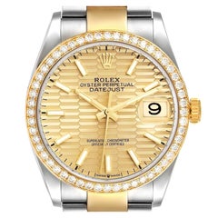 Rolex Montre Datejust en acier avec cadran cannelé en or jaune et diamant 126283, non portée