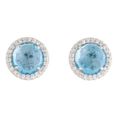 Clous d'oreilles en or blanc avec topaze bleue suisse ronde de 2,39 carats et diamants 