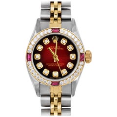 Rolex Montre Oyster Perpetual rouge avec cadran en diamants et lunette en rubis et diamants, pour femmes