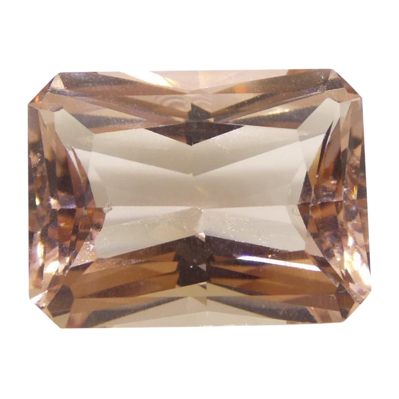 Morganite rose orangé octogonale 24,65 carats certifiée par le GIA