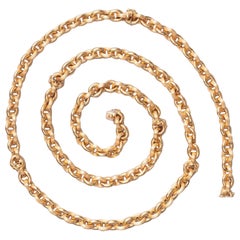 An 18 Carat Gold Long Chain or set of 6 Bracelets