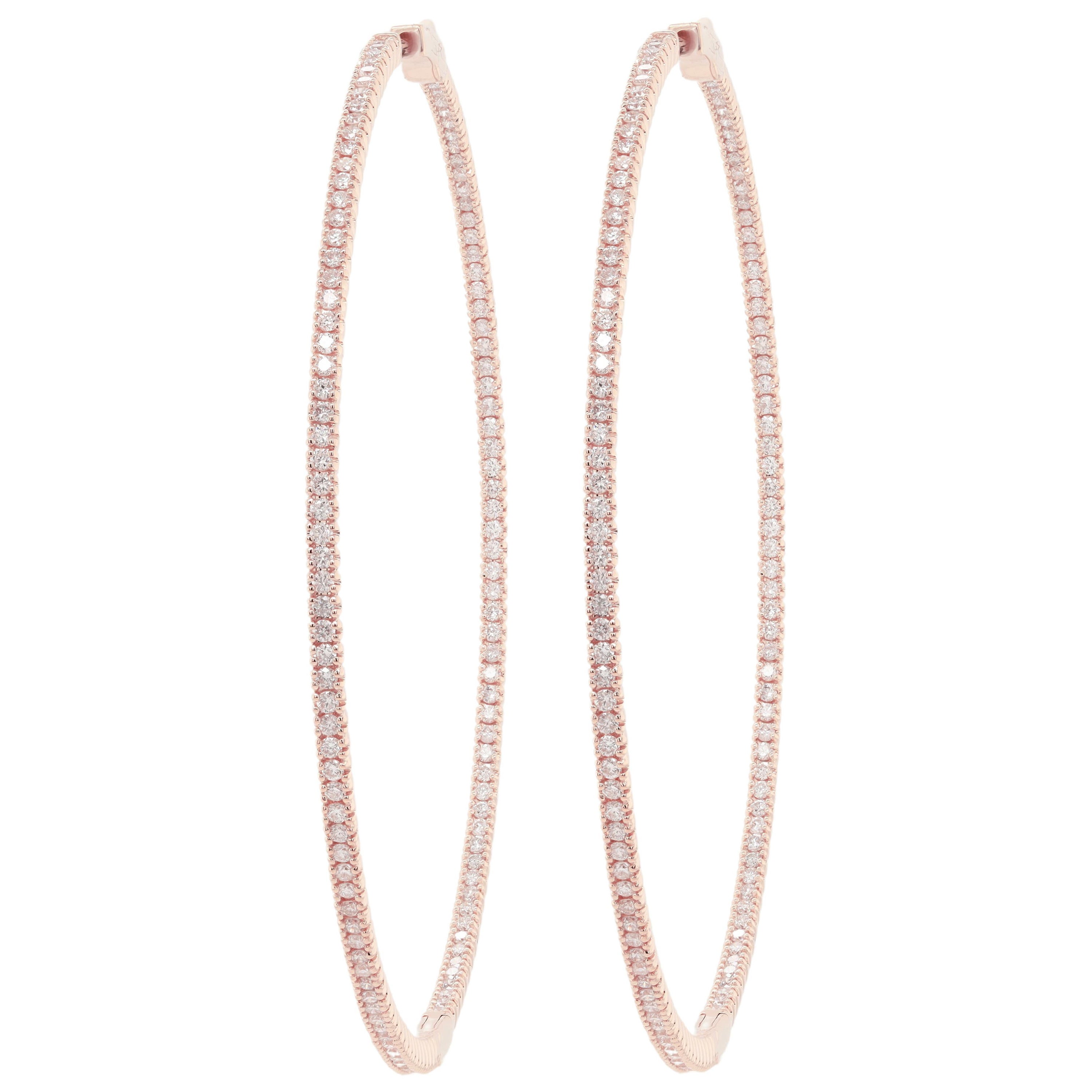 Diana M. 14kt rose gold, 1.75" hoop earrings featuring 1.30 cts round diamond For Sale