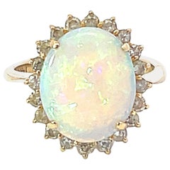 Vintage Opal and Diamond Halo Ring in 14k Yellow Gold