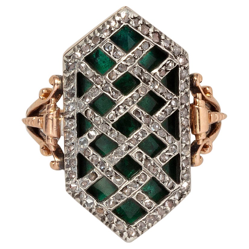 An 18 Carat Gold and Silver Ring with Green Glass and Diamonds For Sale
