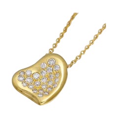 Collana Elsa Peretti for Tiffany & Co. in oro 18 carati con ciondolo a cuore pieno di diamanti