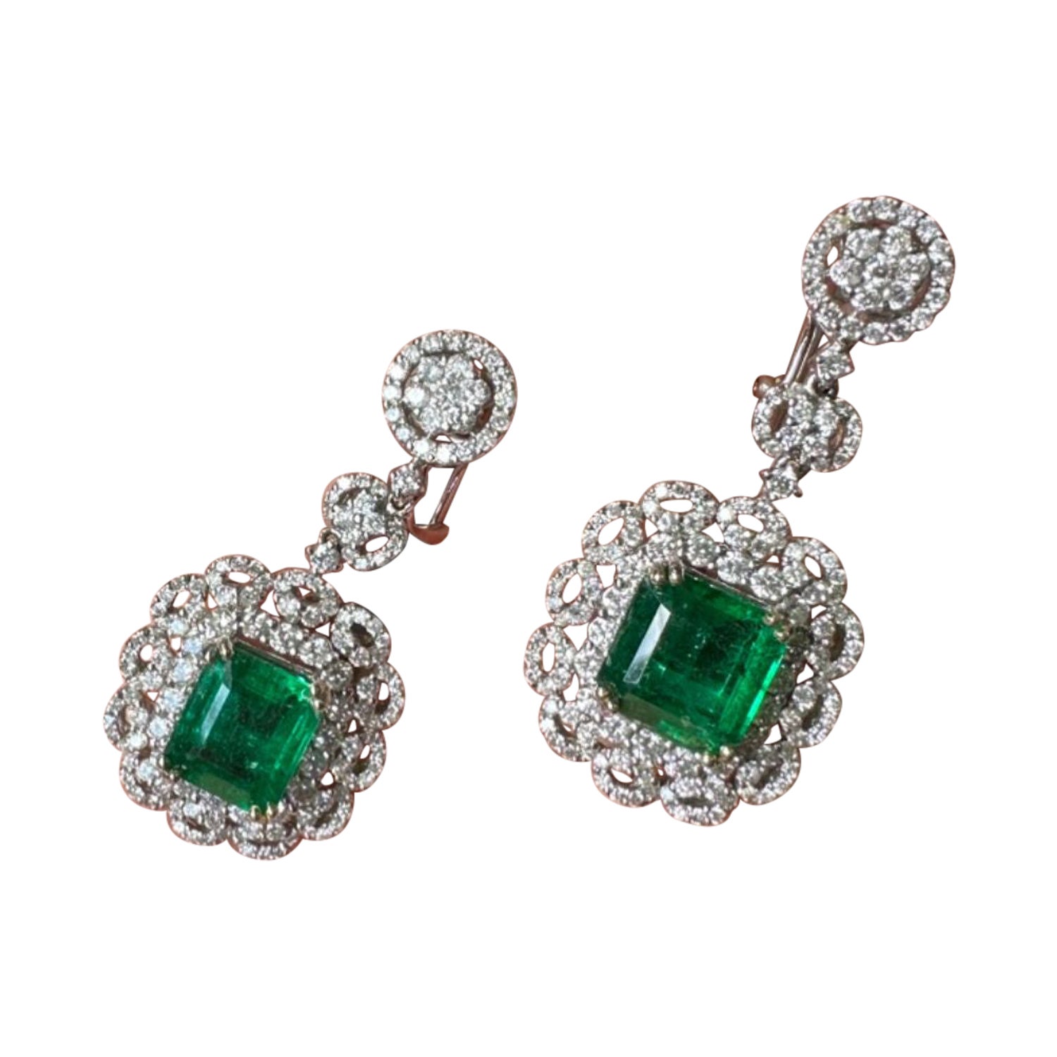 Certified 5.3 Carat Emerald and Diamond Dangle Earrings For Sale