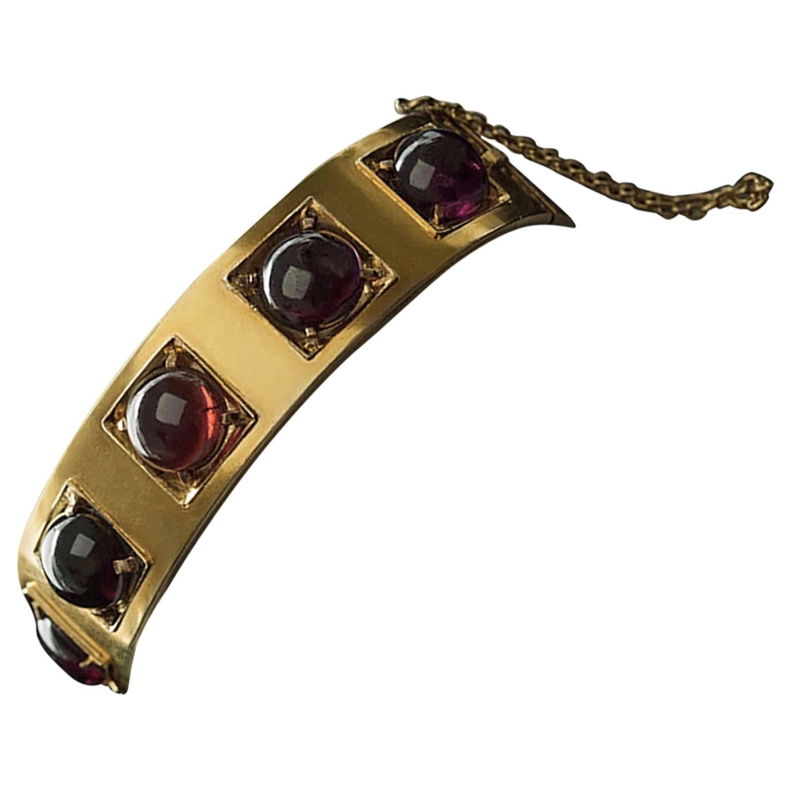 Victorian Garnet Cabochon Gold Bangle Bracelet For Sale