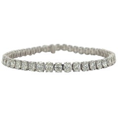 Bracelet tennis en or blanc 18 carats avec diamants taille ovale (10,59 carats VVS) par Arnav