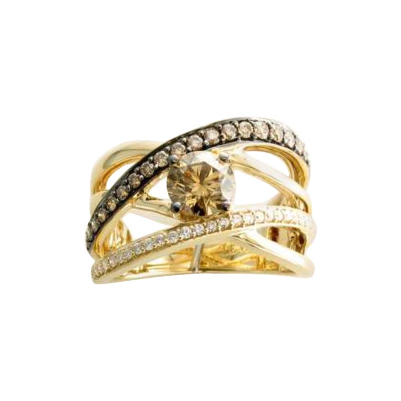 Anello con diamanti cioccolato e diamanti vaniglia incastonati in oro miele 14K