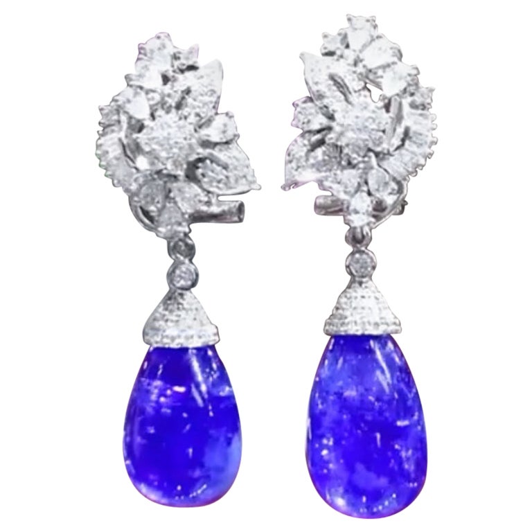 Magnificent  68.25 carats of tanzanites and diamonds on earrings  For Sale