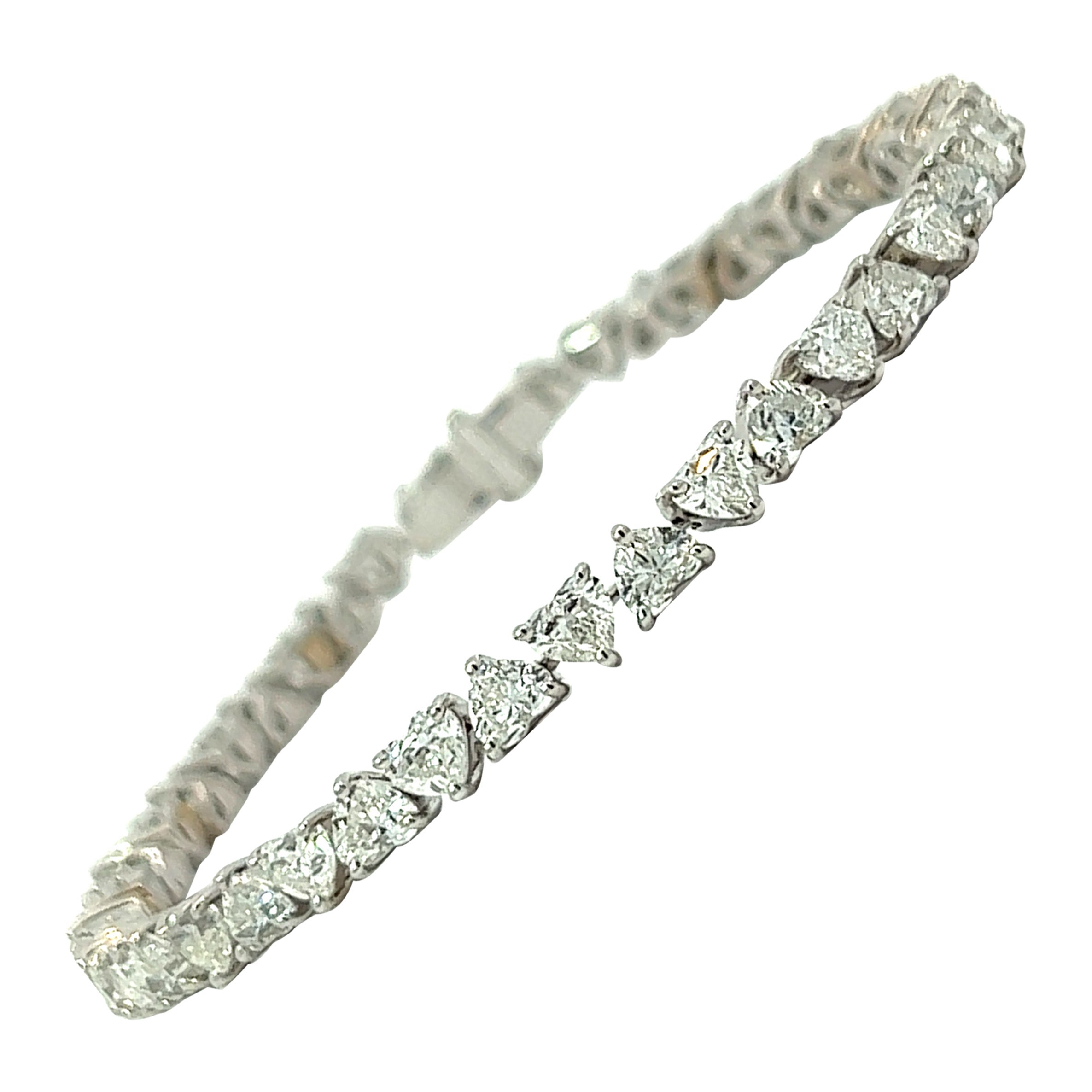 Heart Shape Reversed Diamond Bracelet in 18K White Gold (10.42ct VVS) by Arnav