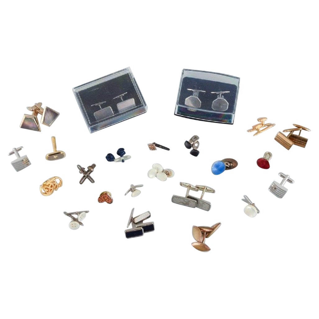 A large collection of Scandinavian cufflinks in gilded metal and plated silver For Sale