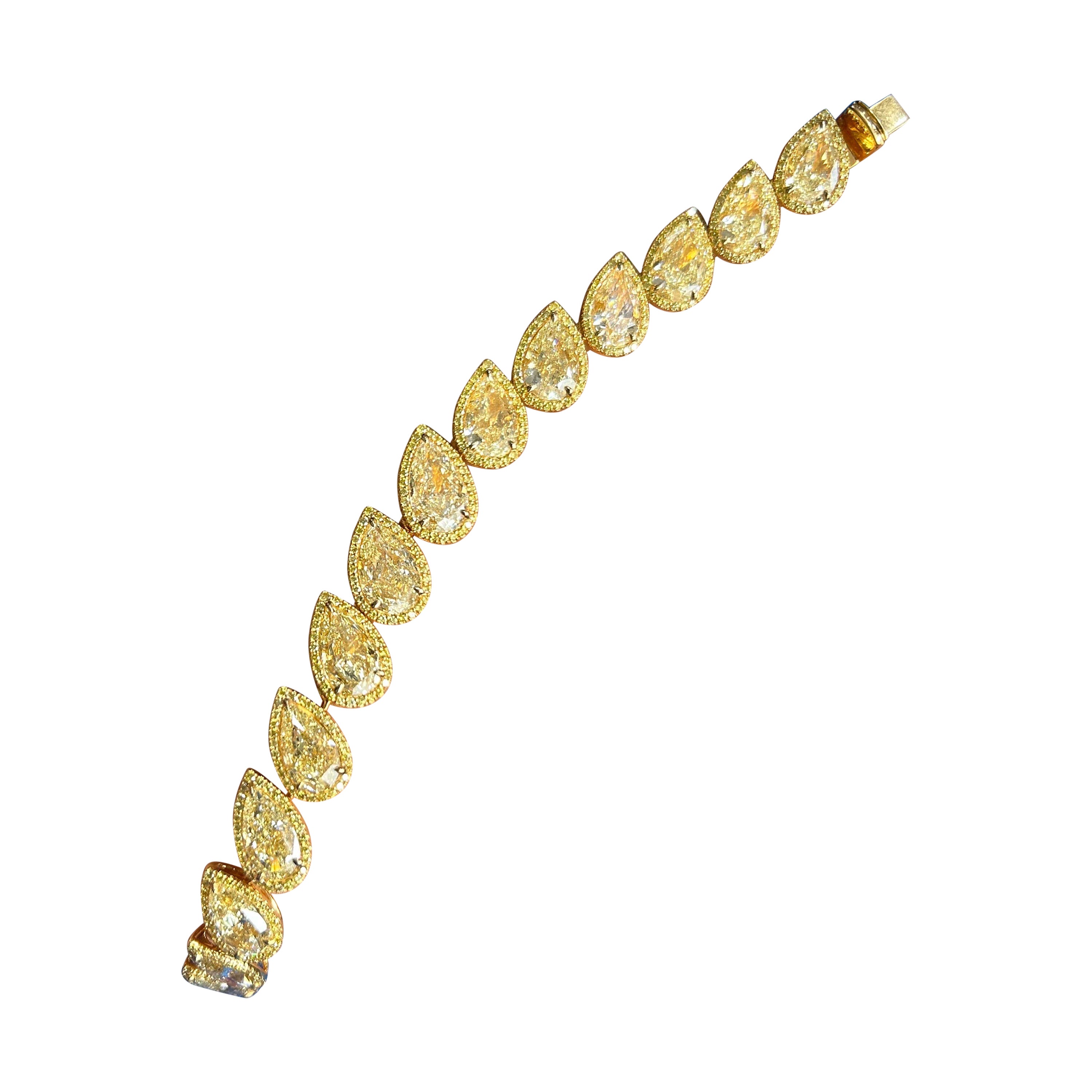 GIA Certified 33.73 Carat Pear Shape Yellow Diamond Bracelet