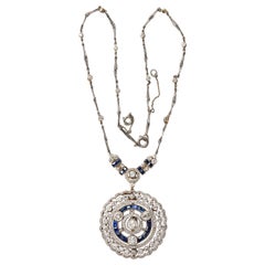 A Diamond and Sapphire necklace or Pendant or Brooch