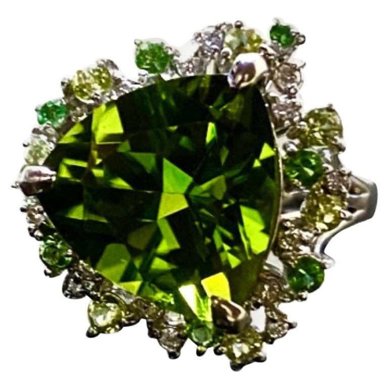 Handmade Platinum Diamond 8.43 Carat Trillion Peridot Engagement Ring For Sale