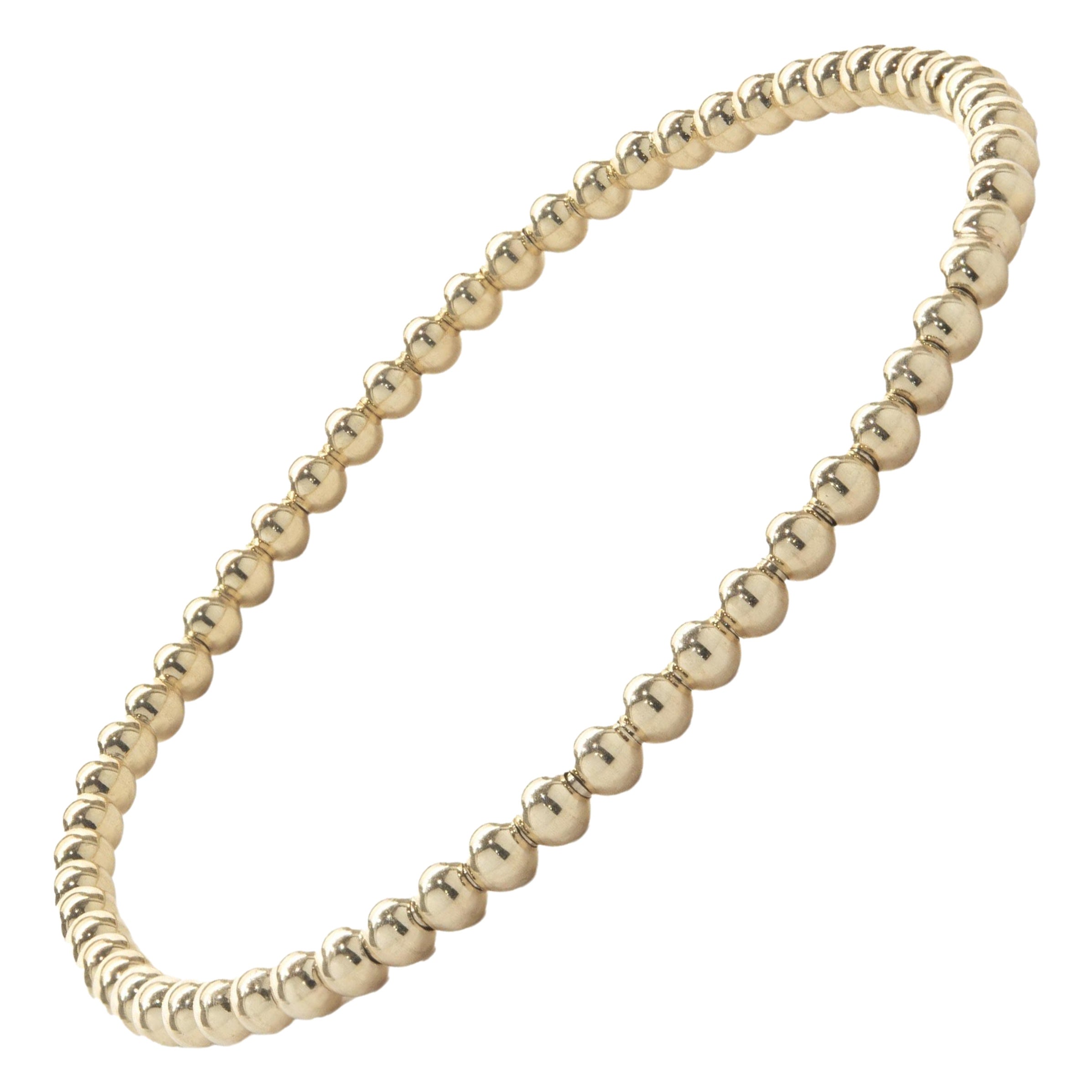 Bracelet flexible en or jaune 14 carats en vente