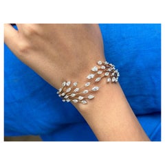 Brazalete de diamantes en forma de marquesa y pera de 5,88 quilates en oro blanco de 18 quilates