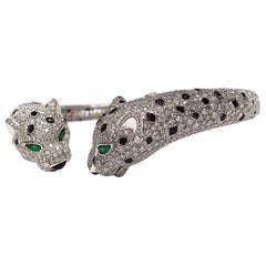 Cartier 18K White Gold Diamond Onyx and Emerald Panthere Bracelet, France