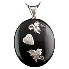 Victorian I cling to thee locket, Whitby Jet and sterling silver 