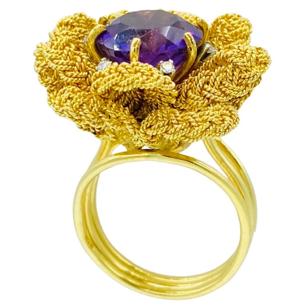 Vintage 6 Carat Amethyst and Diamonds Floral Leaf Cocktail Ring 18k Gold. One of a kind craftsmanship by designer and is signed. The ring features a beautiful leaf design making it look super realistic. The center gemstone is a round cut amethyst
