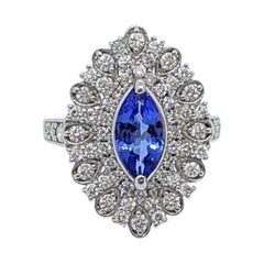 Bague cocktail ronde en platine avec tanzanite marquise et diamants blancs