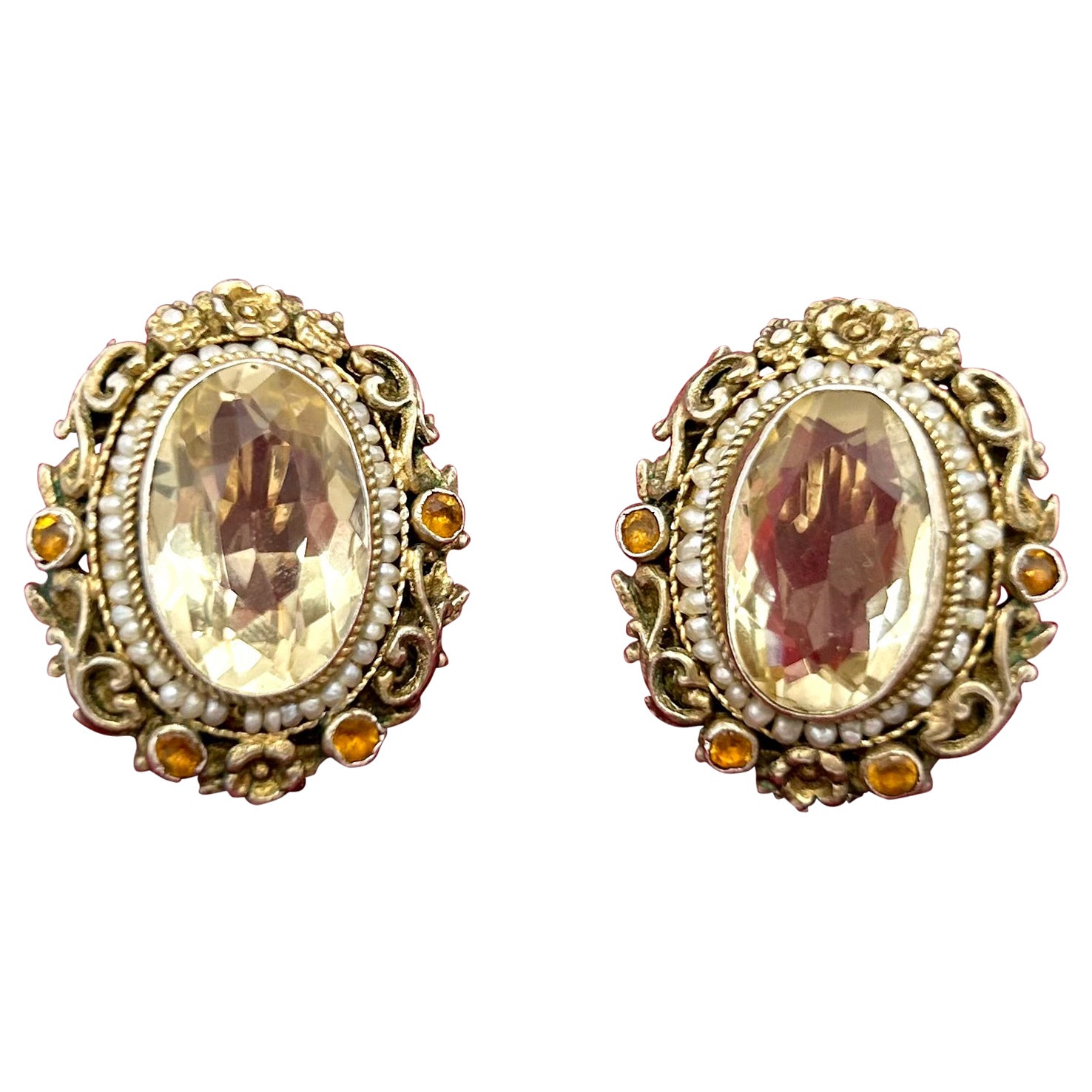 Antique silver earrings with citrines, garnets and pearls, circa 1900.